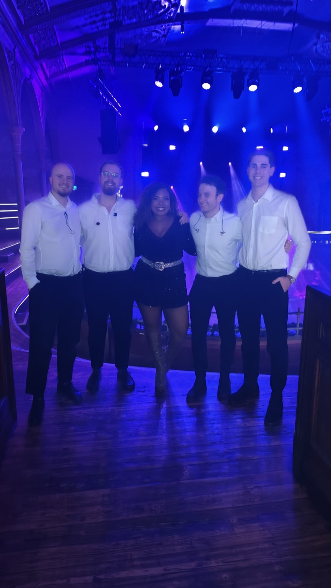 Nicole Battick with her band at a venue