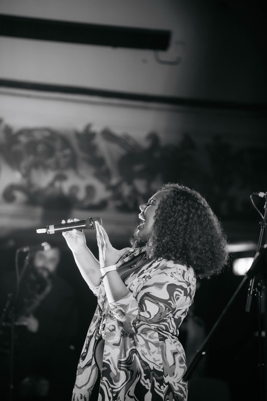 Nicole Battick singing, mid-performance